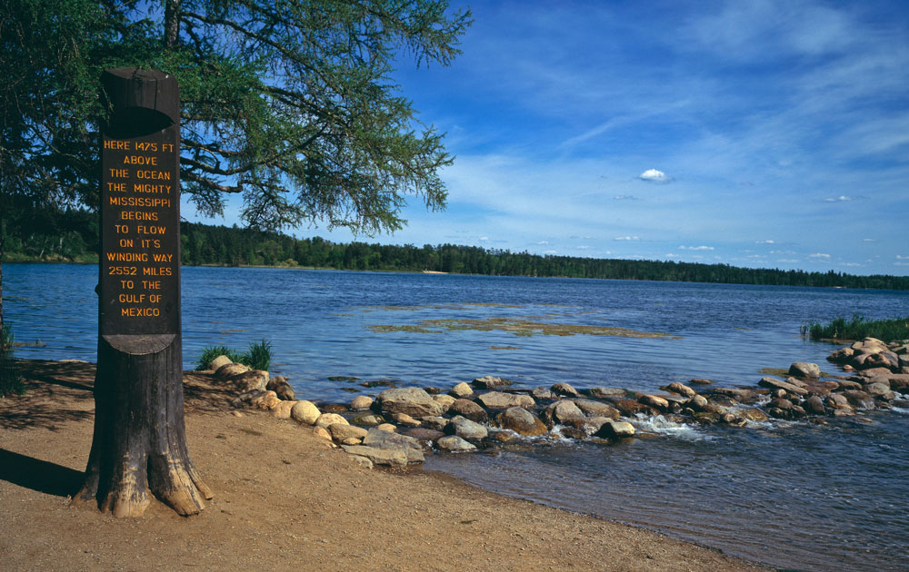 Historic sign marking the Mississippi River's source at Lake Itasca